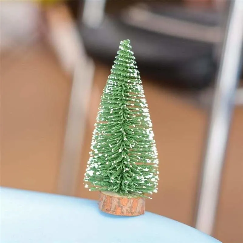 A Small Pine Tree Placed In The Desktop